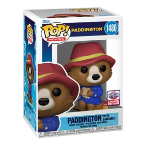 El Funko Paddington 1480 funkon 2024 destaca por su clásico abrigo azul, su inseparable sombrero rojo y, por supuesto, su infaltable maleta de viajero